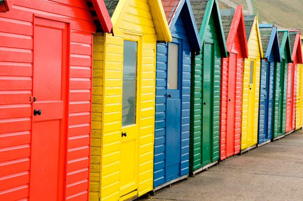 Colorful beach huts in Whitby