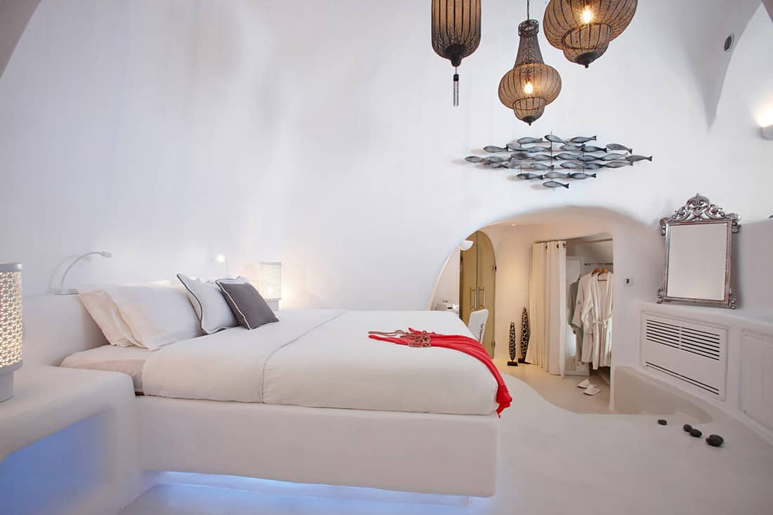 White bedroom with king-size bed