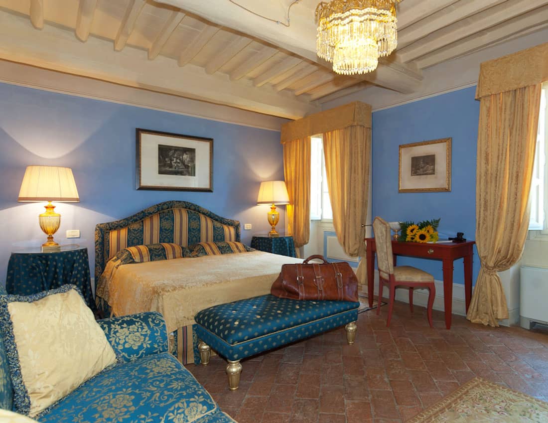 Palatial bedroom with terracotta floors