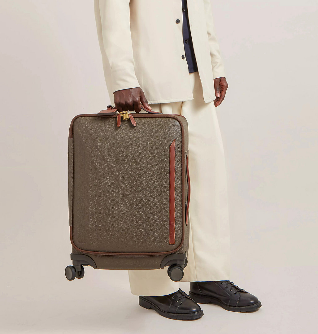 12 Stylish Suitcases That Will Make You Stand Out in Any Airport