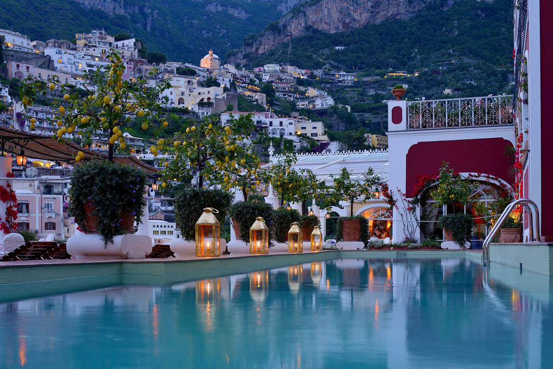 Pool surrounded by lemon trees