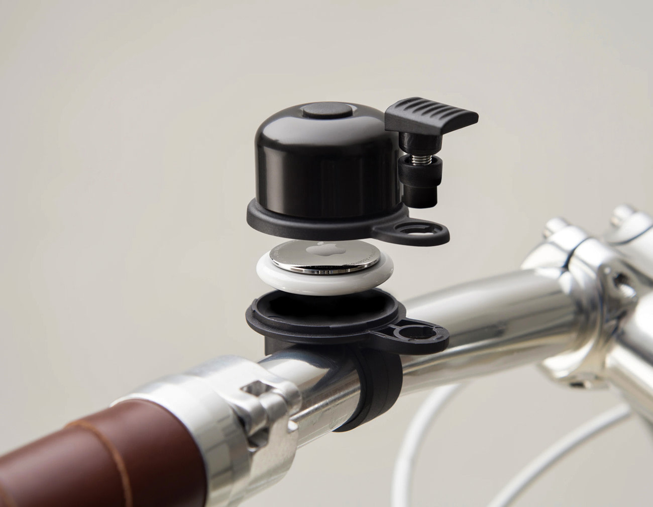 Bike bell with AirTag
