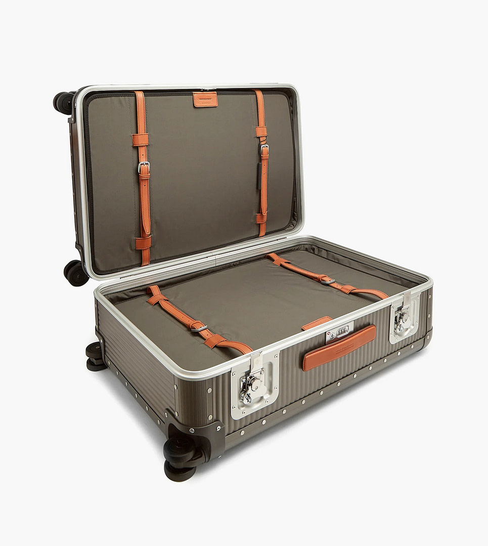 12 Stylish Suitcases That Will Make You Stand Out in Any Airport