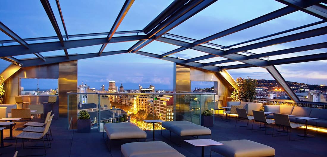 Glass-enclosed rooftop terrace